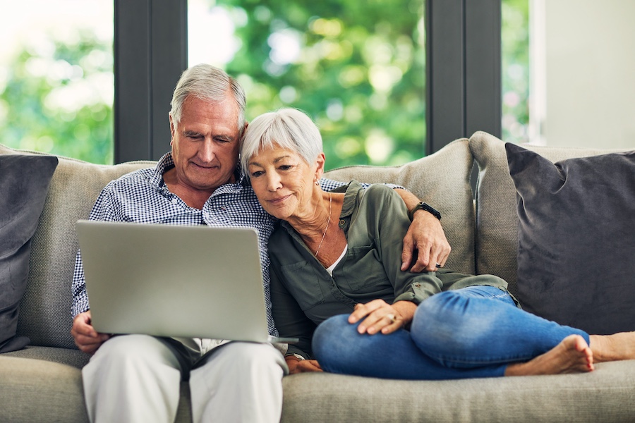 love and elderly couple on sofa for movie